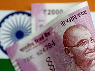 Indian rupee firms up, then drops against dirham as RBI cuts interest rate