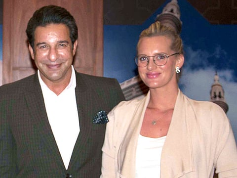  Wasim Akram with his wife Shaniera Thompson during a visit to Sharjah International Book Fair.