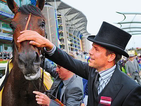 England football ace Owen saddles up for a new ball game