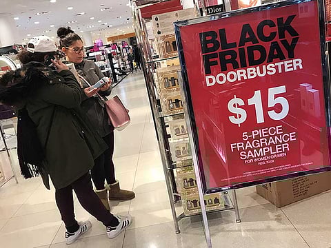 Women shop at a Macy's department store in Roosevelt Field shopping mall in Garden City, New York.