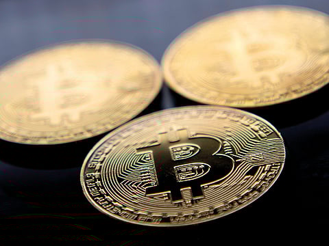 Gold-plated souvenir Bitcoins in London. Gold is good but Bitcoin better, according to $7.5 billion hedge fund SkyBridge Capital