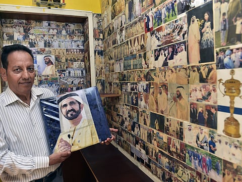 Indian expatriate covers his apartment with Mohammad photos