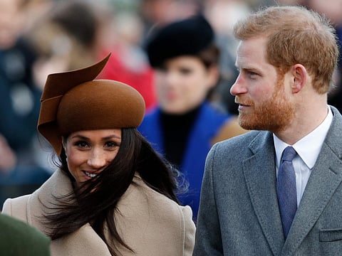 UK's Prince Harry and wife, former actress Meghan Markle