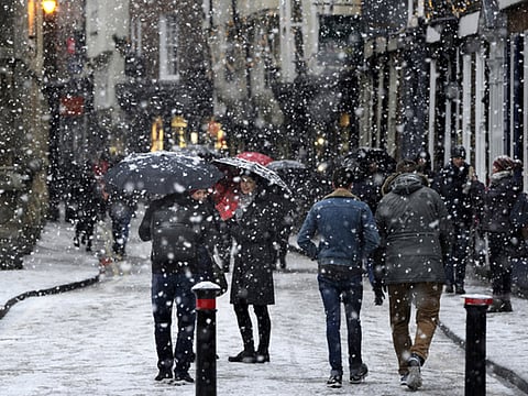 People walk through the snow in York after Britain saw one of the coldest nights of the year with temperatures falling to minus 12.3C at Loch Glascarnoch in the Scottish Highlands overnight, on December 29, 2017.