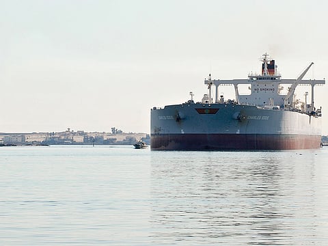 A tanker sails northbound on the Suez Canal in Ismailia, Egypt. Oil fluctuated after a container ship blocked the Suez Canal.