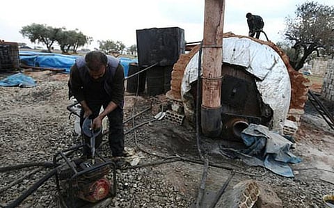 In rebel Syria, makeshift refineries process precious crude