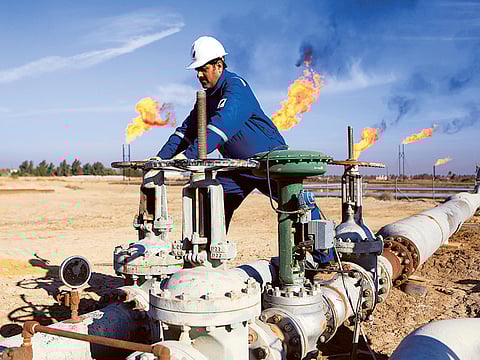 Nihran Bin Omar field north of Basra. The Central Bank of Iraq attributed the devaluation of the dinar to decline in oil prices and the coronavirus pandemic.