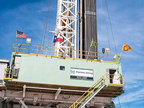 Flags fly from a Royal Dutch Shell oil rig in Texas. The American Petroleum Institute reported U.S. crude stockpiles rose by 3.86 million barrels in the past week.