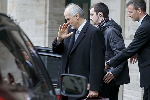 Bashar Al Jaafari leaves the Palais des Nations after holding talks with Staffan de Mistura in Geneva, on Friday.