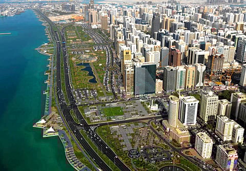 An aerial view of Abu Dhabi city. Abu Dhabi Fund for Development (ADFD) on Sunday announced a Dh1 billion initiative to support national companies that have seen their businesses affected by the COVID-19 pandemic.