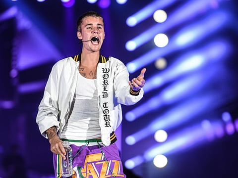 Justin Bieber fined for using phone while driving