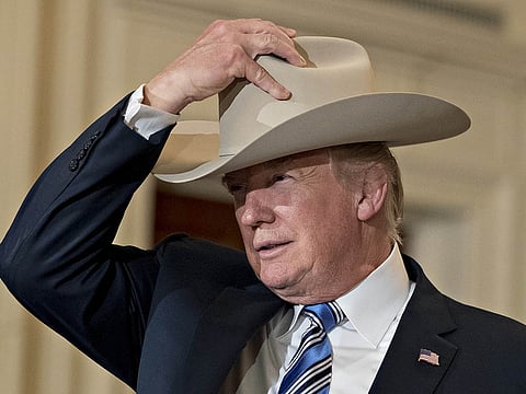 Andrew Harrer/Bloomberg