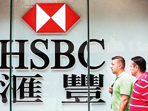 Pedestrians walk past HSBC signage in the Admiralty district of Hong Kong. Politicians in the US and Britain have castigated the bank for supporting the national security law in Hong Kong.