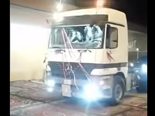 Watch: Groom arrives at wedding reception in truck 