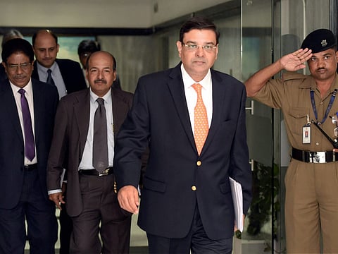 RBI Governor Urjit Patel along with deputy governors arrive for a press conference to
announce the RBI monetary policy, in Mumbai on Wednesday. 