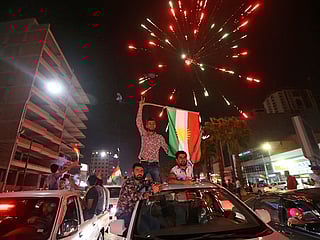 Iranian Kurds march in support of referendum