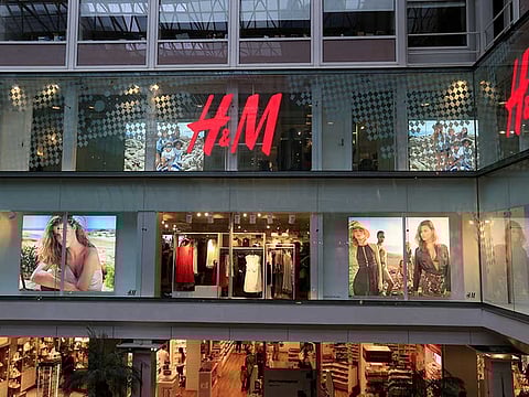 H&M disappeared from the internet in China as the government raised pressure on shoe and clothing brands and announced sanctions Friday against British officials.