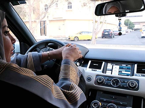 A Saudi woman drives her car along a street in the Saudi coastal city of Jeddah [File image]