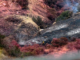 Los Angeles ‘turns corner’ on largest wildfire in city history