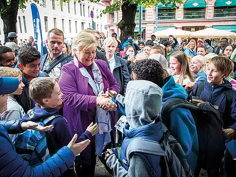 Norwegian school children interact with their Prime Minister Erna Solberg in Oslo, Norway