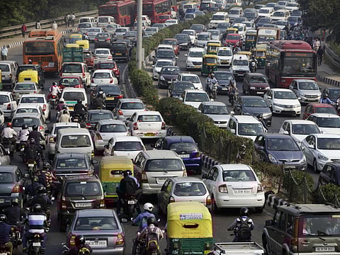 Traffic in New Delhi during rush hour. A new law will require manufacturers of cheap cars to add a string of features.