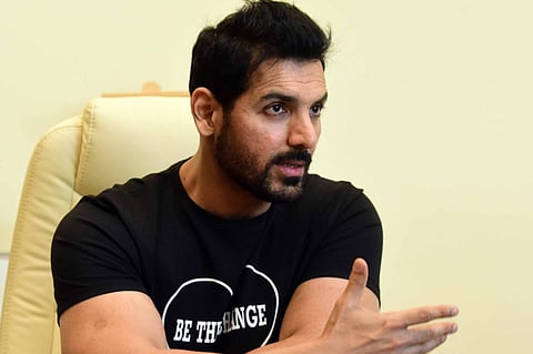 John Abraham wants to make the world a better place