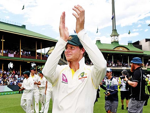 Australia’s captain Steve Smith (centre) acknowledges the cheers after Australia retained the Ashes trophy.
