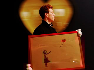 Banksy artwork self-destructs right after $1.4 million sale