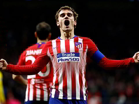 Atletico Madrid's Antoine Griezmann celebrates scoring their second goal.
