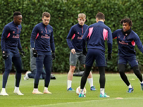 Arsenal's Danny Welbeck, Aaron Ramsey, Emile Smith-Rowe and Alex Iwobi during training atSt Albans, Britain.