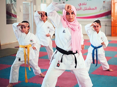 Bessan Al Khairye, who started teaching karate to girls at the age of 21 with five students.