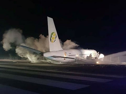The site of a Fly Jamaica plane crash is seen in the Cheddi Jagan International Airport, Guyana November 9, 2018, in this image obtained from social media Cheddi Jagan International Airport.