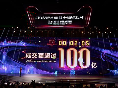 Live updates of sales figures are displayed on a large screen during Alibaba Group Holding Ltd.'s annual November 11 Singles' Day online shopping event in Shanghai, China, on Sunday, Nov. 11, 2018.