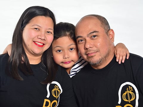 Rowena and Homer Rapodos with their 11-year old daughter Samantha 