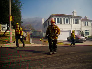 Fire crews in grim search for California's dead