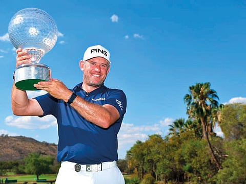 Lee Westwood with the Nedbank Challenge trophy. This is his first title since the Maybank Malaysian Open in 2014. 