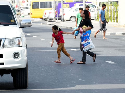 Pedestrians crossing the road from an undesignated spot in Satwa, Dubai. Picture for illustrative purpose only.