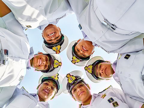Indian Navy’s all-women crew of INSV Tarini (right) at Raisina Hill, in New Delhi, in May.