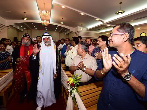Shaikh Nahayan and Rev Joseph Mar Barnabas being welcomed by the congregation at the Mar Thoma Church.