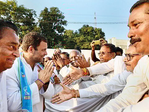 Congress president Rahul Gandhi meets party supporters and workers during a rally at the Mahatma Gandhi Stadium Ground in Mandla district, on Friday. Rahul challenged Modi to break his silence on the tainted Rafale aircraft deal.