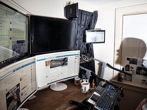 Christopher Blair sits at his desk at home in Maine and checks his Facebook page, America's Last Line of Defense. 