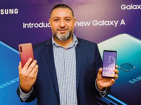 Tarek Sabbagh, head of IT and the Mobile Division at Samsung Gulf Electronics, with the Galaxy A9.