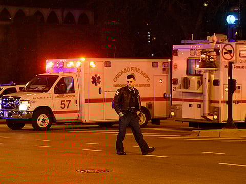 A Chicago police officer works the scene after a gunman opened fire at Mercy Hospital, Monday, Nov. 19, 2018, in Chicago.