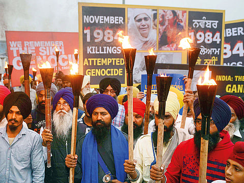 The Dal Khalsa radical Sikh organisation holds a protest march over the 1984 anti-Sikh riots, in Amritsar earlier this month.
