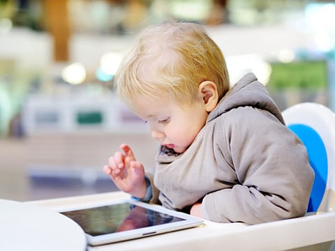 Do parents depend on tablets and smartphones to babysit their children?