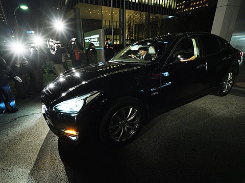 A car believed to be carrying company executives leaves the  Nissan Motor Co. Global Headquarters in Yokohama near Tokyo Thursday, November 22, 2018. 