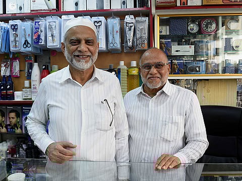 Mohammad Jaffer (left) and Mohammad Rizwan have been running their gift shop selling cosmetics, garments and electronics near Hamdan Street in Abu Dhabi since 1972.