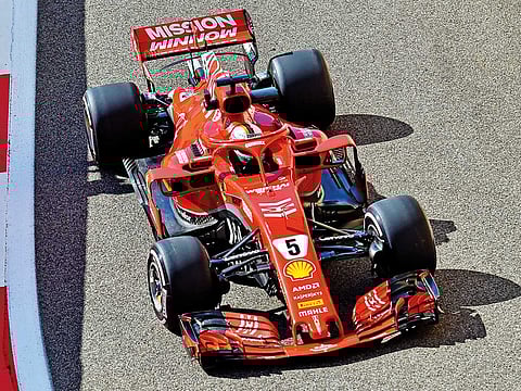 Sebastian Vettel of Ferrari in action during a practice session at the Yas Marina Circuit,