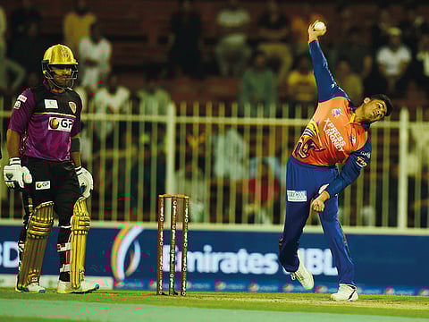 Mujeeb Ur Rahman of Bengal Tigers bowls against Punjabi Legends at the Sharjah Cricket Stadium.