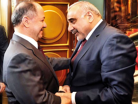 A handout picture released by Iraq's Prime Minister's Media Office on November 22, 2018 shows PM Adel Abdel Mahdi (R) meeting with prominent Kurdish leader Massud Barzani in Baghdad during the latter's first visit to the capital in over two years.